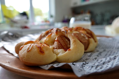 Close-up of bread in plate on table