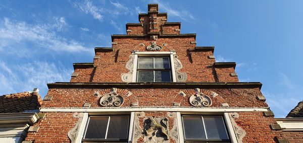 Low angle view of building against sky