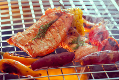 Close-up of meat on barbecue grill