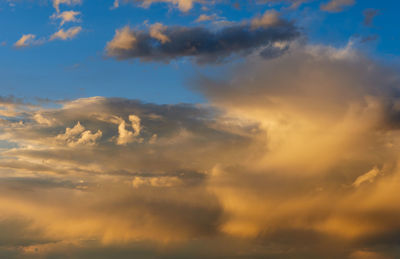 Low angle view of dramatic sky during sunset