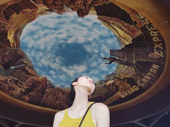 Woman looking through arch