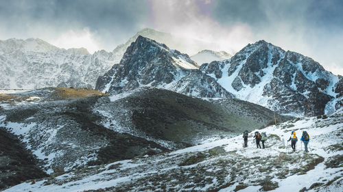 Panoramic view of snowcapped mountains against sky