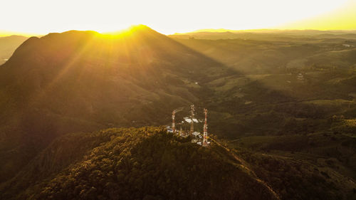 Scenic view of mountains against sky during sunset