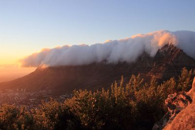 Scenic view of mountains against sky during sunset