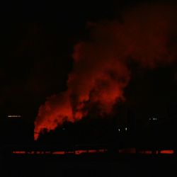 View of illuminated city at night