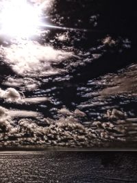 Scenic view of sea against sky at night