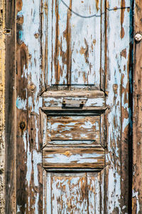 Full frame shot of rustic wooden door