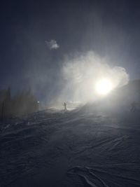 Scenic view of snow against sky