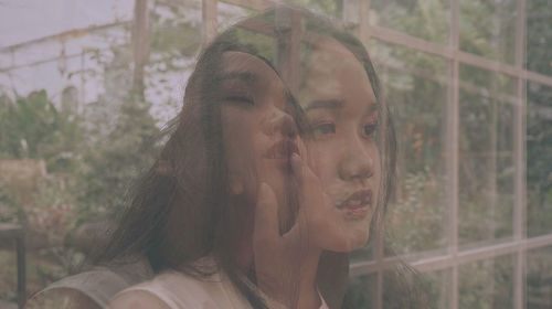Multiple exposure image of woman outdoors