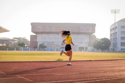 Full length of woman running