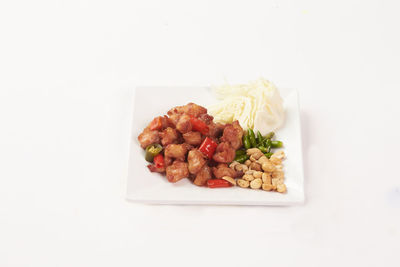 High angle view of vegetables in plate on table