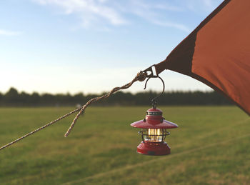 Low angle view of windmill against sky