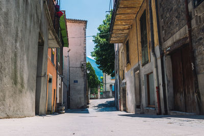 Alley amidst buildings in city