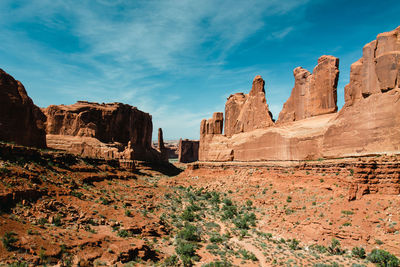 Rock formations on mountain against sky