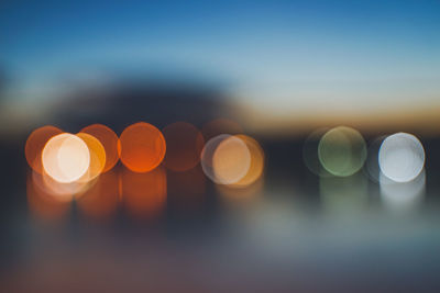 Close-up of illuminated lights at night