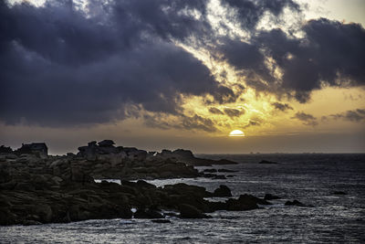 Scenic view of sea against sky during sunset