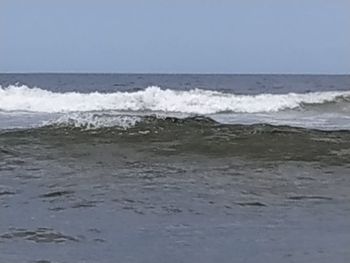 Scenic view of sea against clear sky