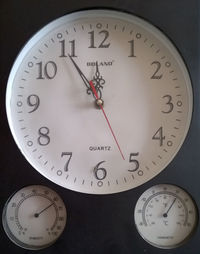 Close-up of clock on wall