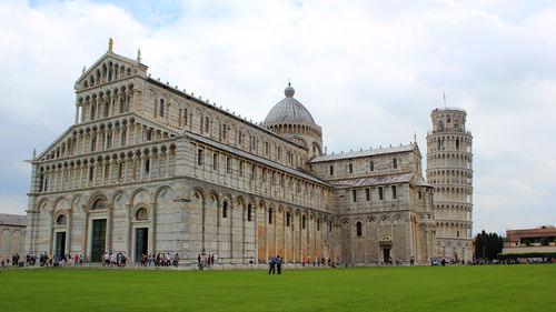 Group of people in front of historical building