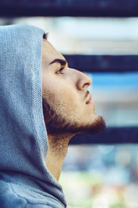 Close-up of young man looking away