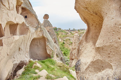 Panoramic view of rock formation against sky
