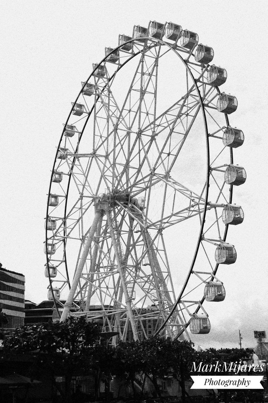 LOW ANGLE VIEW OF FERRIS WHEEL