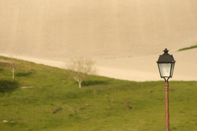 Close-up of street light against sky