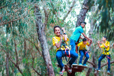 Young couple kissing in forest