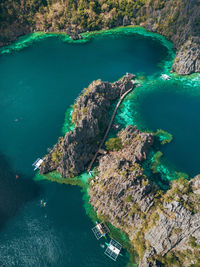 High angle view of rocks on sea