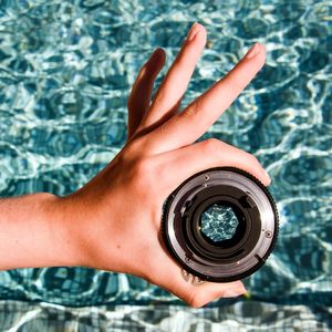 Close-up of young woman in water