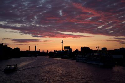 Dramatic sky over city at sunset