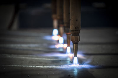 Close-up of burning candles