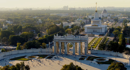 High angle view of trees and buildings in city