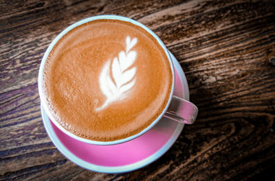 High angle view of cappuccino on table