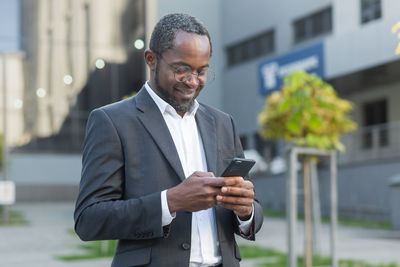 Young man using mobile phone