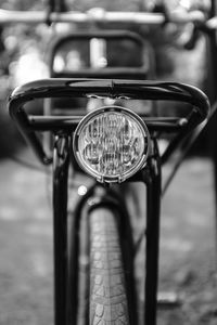Close-up of bicycle taillight on street