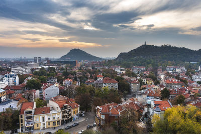 High angle view of townscape against sky at sunset