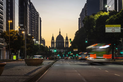 City street amidst buildings against sky