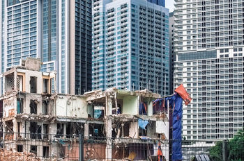 A building being demolish in the city