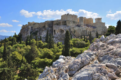 Scenic view of cliff against sky