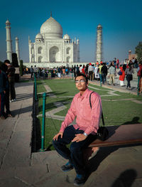 Portrait of tourists at historical building taj