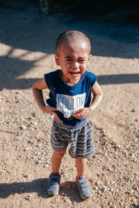 Full length portrait of cute boy