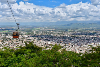 Aerial view of townscape against sky