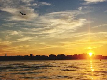 Scenic view of sea at sunset