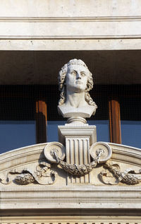 Low angle view of statue against sky