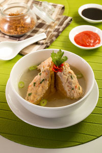 Close-up of tofu soup in bowl on table