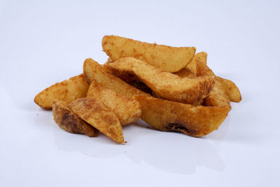 High angle view of bread against white background