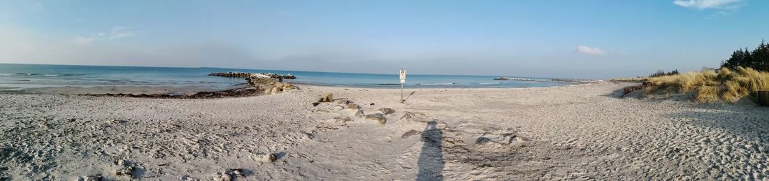 Panoramic view of beach against sky