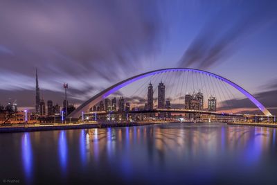 Reflection of illuminated buildings in water