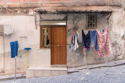 Clothes drying against building